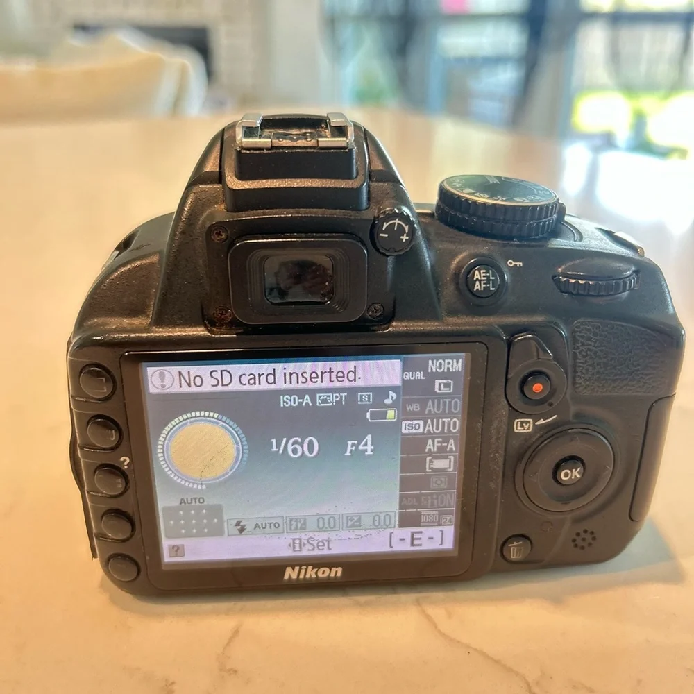Nikon D3100 DSLR Camera with 55-200mm lens